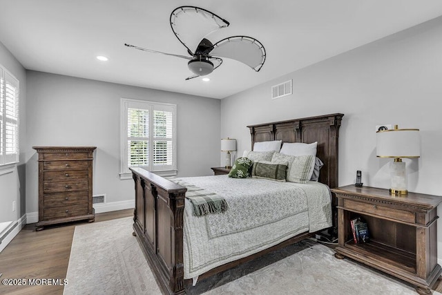 32 Blackbriar Dr, Colts Neck, NJ 07722 - bedroom with wood finished floors, recessed lighting, and a ceiling fan