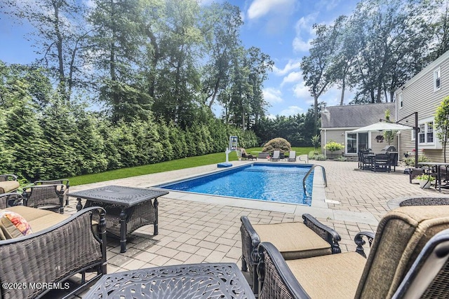 32 Blackbriar Dr, Colts Neck, NJ 07722 - swimming pool with outdoor dining area, a patio area, and an outbuilding