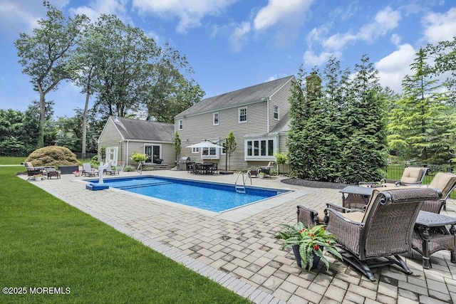 32 Blackbriar Dr, Colts Neck, NJ 07722 - swimming pool featuring a patio, a storage structure, an outbuilding, and a yard