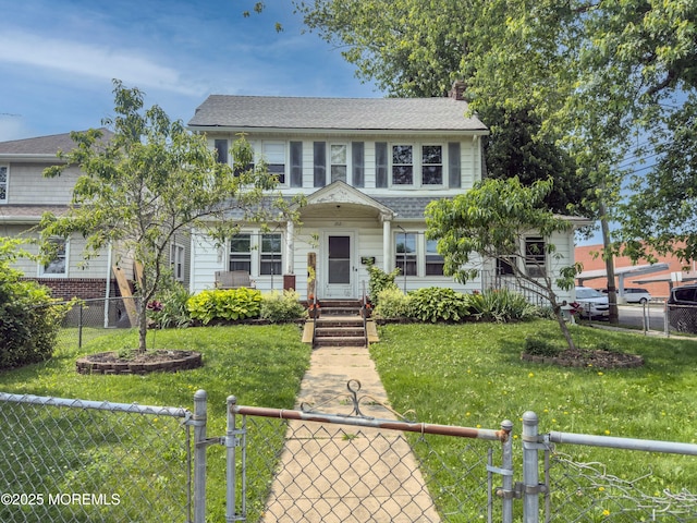 192 Bath Ave, Long Branch, NJ 07740 - view of front facade with a gate, a fenced front yard, and a chimney