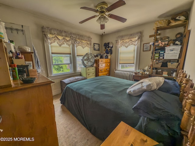 192 Bath Ave, Long Branch, NJ 07740 - bedroom with carpet floors, radiator heating unit, and ceiling fan