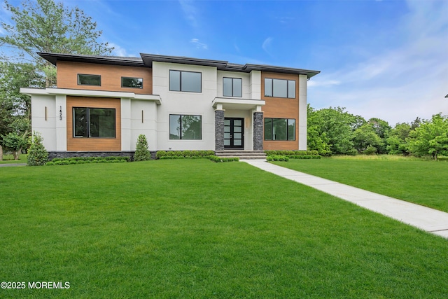 1423 Anthony Ct, Toms River, NJ 08753 - modern home with a front yard and stucco siding