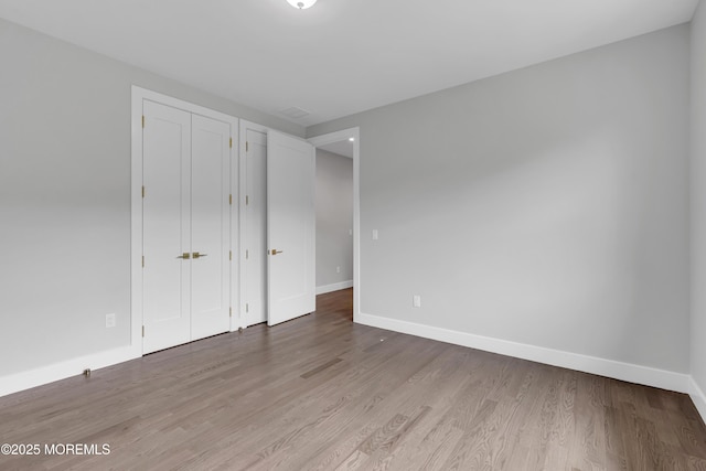 1423 Anthony Ct, Toms River, NJ 08753 - unfurnished bedroom with baseboards and light wood-style flooring