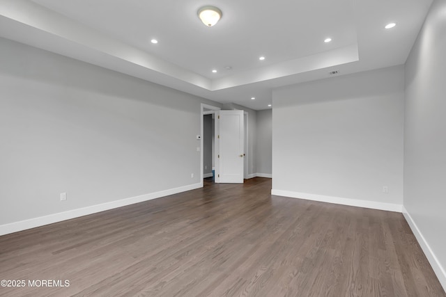 1423 Anthony Ct, Toms River, NJ 08753 - unfurnished room with recessed lighting, wood finished floors, and a raised ceiling