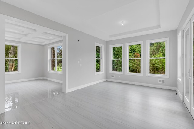 1423 Anthony Ct, Toms River, NJ 08753 - unfurnished room featuring beamed ceiling, a tray ceiling, and coffered ceiling
