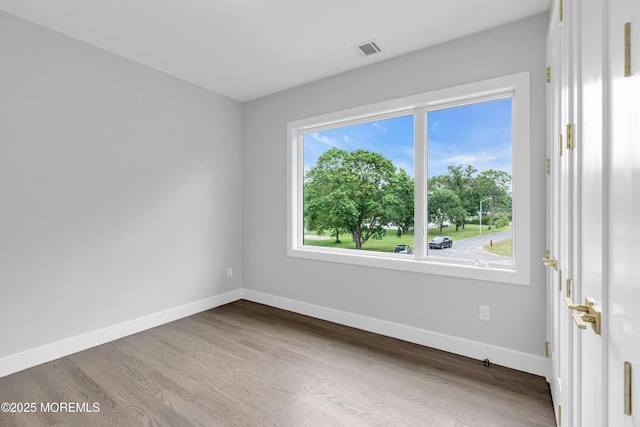 1423 Anthony Ct, Toms River, NJ 08753 - spare room featuring wood finished floors
