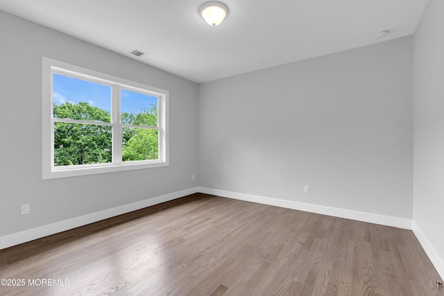 1423 Anthony Ct, Toms River, NJ 08753 - unfurnished room with wood finished floors and a smoke detector
