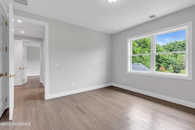 1423 Anthony Ct, Toms River, NJ 08753 - unfurnished room with wood finished floors and recessed lighting