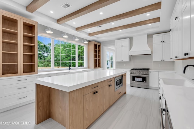 1423 Anthony Ct, Toms River, NJ 08753 - kitchen with custom range hood, appliances with stainless steel finishes, a kitchen island, light countertops, and beamed ceiling
