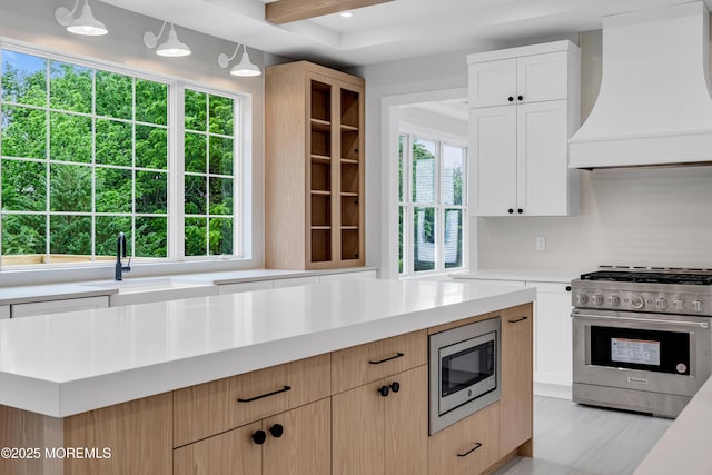 1423 Anthony Ct, Toms River, NJ 08753 - kitchen featuring appliances with stainless steel finishes, wall chimney exhaust hood, light countertops, white cabinetry, and light brown cabinets