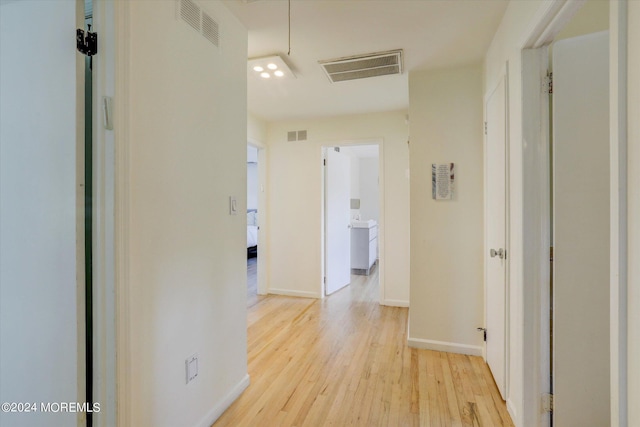 12 Harbor Ct, West Long Branch, NJ 07764 - hall with light wood-type flooring and attic access