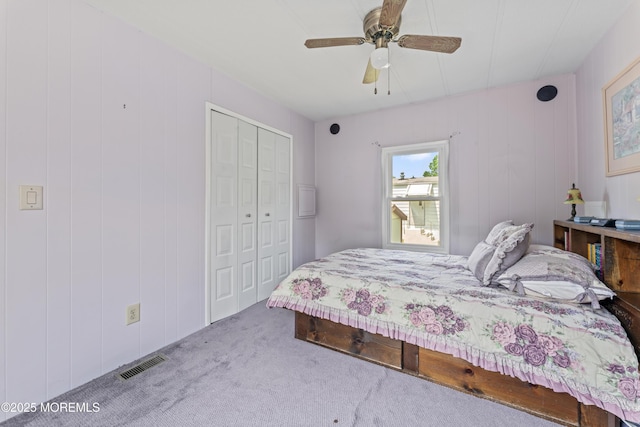 124 Village Rd, Morganville, NJ 07751 - carpeted bedroom with a closet and a ceiling fan