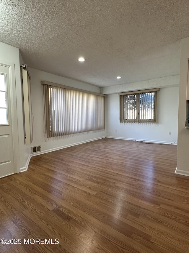 115 Brandywine Ct Unit 115, Brick, NJ 08724 - empty room with a textured ceiling, wood finished floors, and recessed lighting