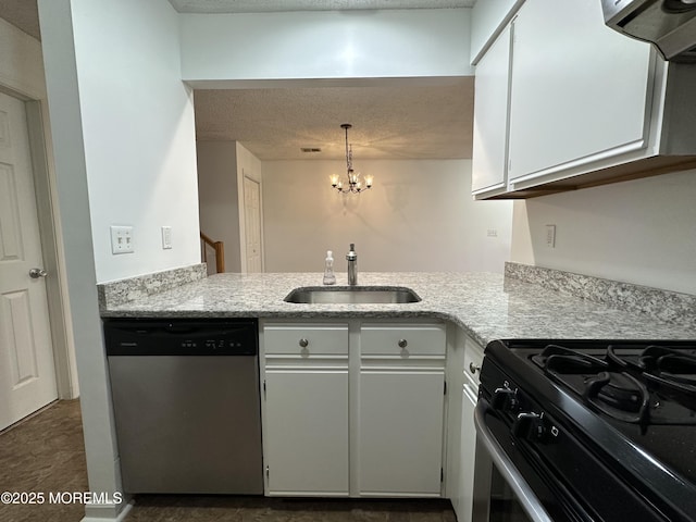 115 Brandywine Ct Unit 115, Brick, NJ 08724 - kitchen with dishwasher, range hood, a textured ceiling, white cabinetry, and a chandelier