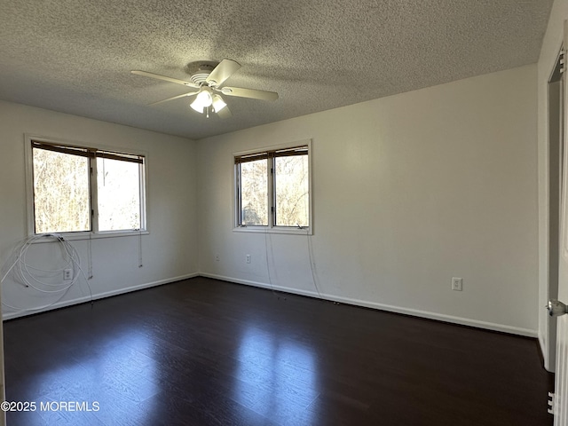 115 Brandywine Ct Unit 115, Brick, NJ 08724 - unfurnished room featuring a textured ceiling, dark wood-type flooring, and ceiling fan