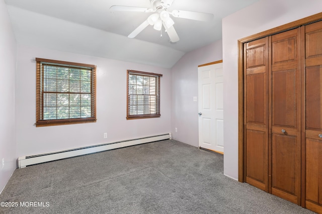 149 9th St, Belford, NJ 07718 - unfurnished bedroom with a baseboard radiator, carpet flooring, lofted ceiling, a closet, and ceiling fan
