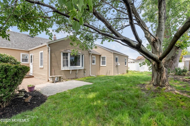 149 9th St, Belford, NJ 07718 - back of house featuring a chimney and a patio area