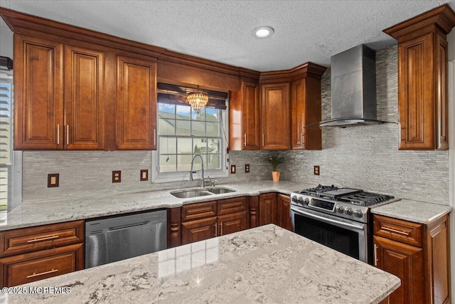 519 Gilford Ave, Toms River, NJ 08753 - kitchen featuring wall chimney exhaust hood, appliances with stainless steel finishes, a textured ceiling, brown cabinets, and light stone countertops