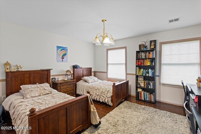 519 Gilford Ave, Toms River, NJ 08753 - bedroom featuring a chandelier and dark wood-style floors