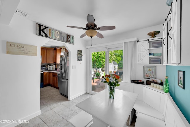 5 Robert Ave, Howell, NJ 07731 - dining room with ceiling fan and light tile patterned floors