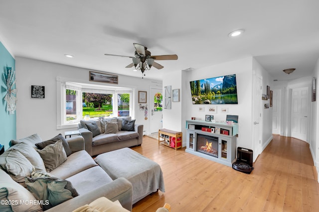 5 Robert Ave, Howell, NJ 07731 - living area with ceiling fan, light wood finished floors, recessed lighting, and a glass covered fireplace