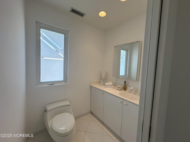 5205 Ocean Dr S, Brigantine City, NJ 08203 - half bathroom with vanity and tile patterned flooring