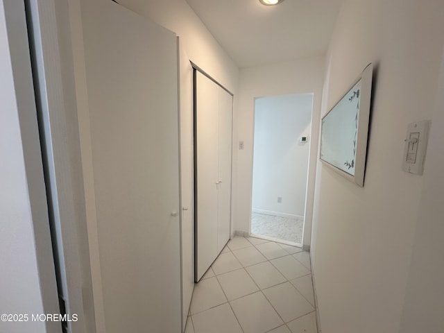 5205 Ocean Dr S, Brigantine City, NJ 08203 - corridor with light tile patterned floors
