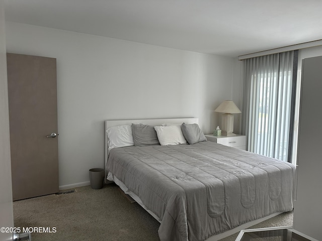 5205 Ocean Dr S, Brigantine City, NJ 08203 - carpeted bedroom with multiple windows