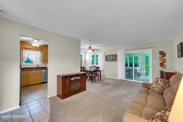7 Robinson Rd, Brick, NJ 08724 - living room with a ceiling fan and light tile patterned floors