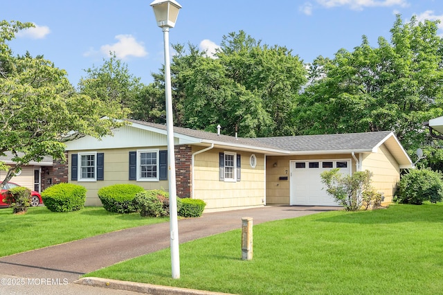 7 Robinson Rd, Brick, NJ 08724 - ranch-style house with a garage, asphalt driveway, and a front lawn