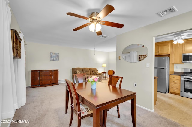 7 Robinson Rd, Brick, NJ 08724 - dining room with a ceiling fan and light carpet