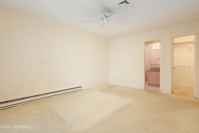 33 Claremont Ct, Red Bank, NJ 07701 - empty room featuring baseboard heating, light colored carpet, and ceiling fan