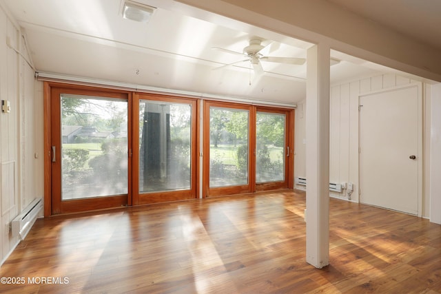 33 Claremont Ct, Red Bank, NJ 07701 - unfurnished living room with a baseboard heating unit, plenty of natural light, a ceiling fan, and wood finished floors