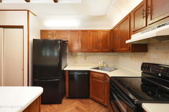 33 Claremont Ct, Red Bank, NJ 07701 - kitchen with black appliances, under cabinet range hood, light countertops, and tasteful backsplash