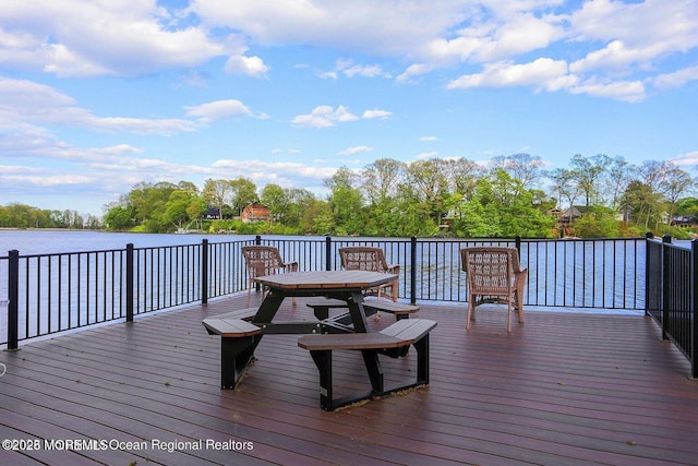 33 Claremont Ct, Red Bank, NJ 07701 - wooden terrace with a water view and outdoor dining area