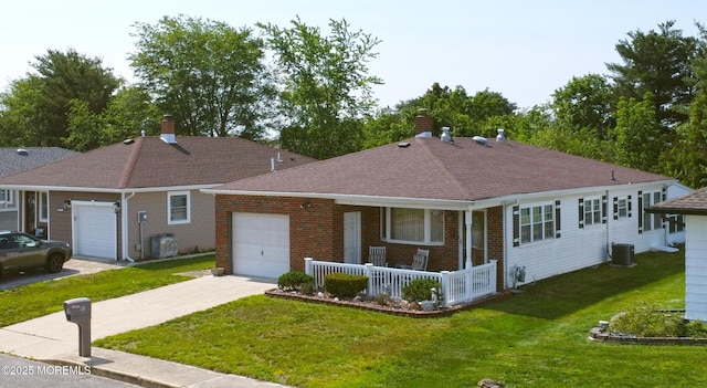 861 Jamaica Blvd, Toms River, NJ 08757 - ranch-style home with an attached garage, covered porch, a front lawn, and brick siding