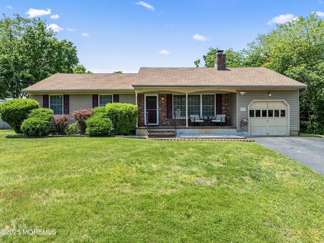 1523 Marconi Rd, Wall, NJ 07719 - ranch-style home featuring an attached garage, driveway, a porch, a chimney, and a front yard