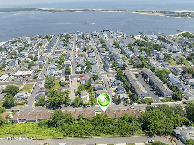 255 Shore Dr Unit 8, Highlands, NJ 07732 - aerial view of property and surrounding area featuring a nearby body of water and nearby suburban area