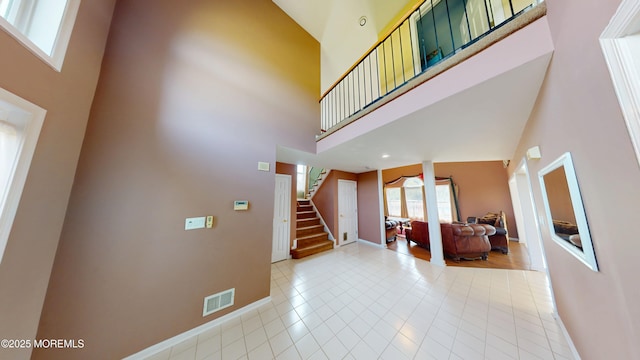 5 Samantha Dr, Monroe, NJ 08831 - entryway featuring a high ceiling, stairway, and light tile patterned flooring