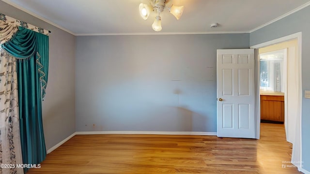 5 Samantha Dr, Monroe, NJ 08831 - empty room with light wood-style flooring, ornamental molding, and a smoke detector