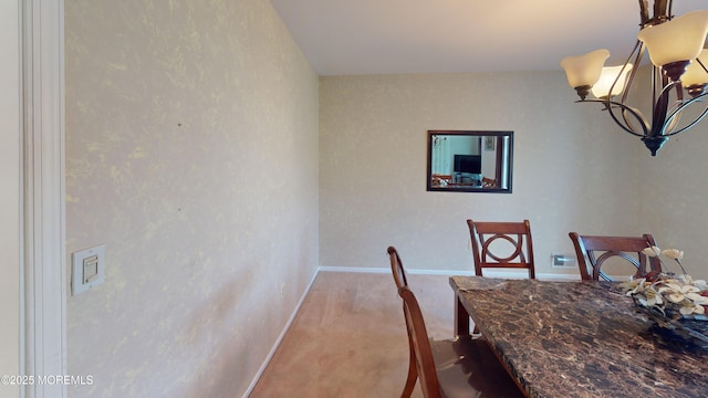 5 Samantha Dr, Monroe, NJ 08831 - carpeted dining room with a chandelier and baseboards