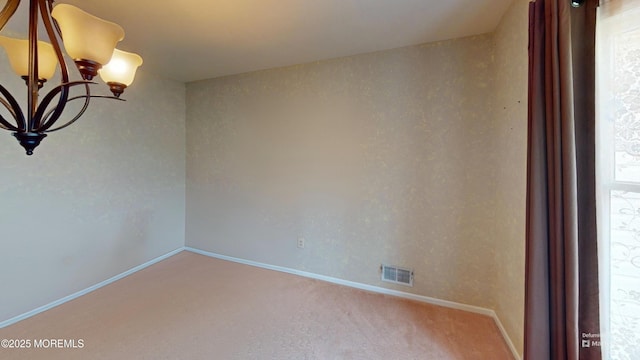 5 Samantha Dr, Monroe, NJ 08831 - carpeted spare room featuring a chandelier and baseboards