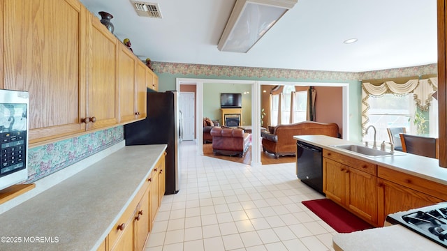 5 Samantha Dr, Monroe, NJ 08831 - kitchen with black dishwasher, light countertops, open floor plan, and freestanding refrigerator