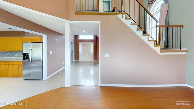 5 Samantha Dr, Monroe, NJ 08831 - staircase featuring wood finished floors and a towering ceiling