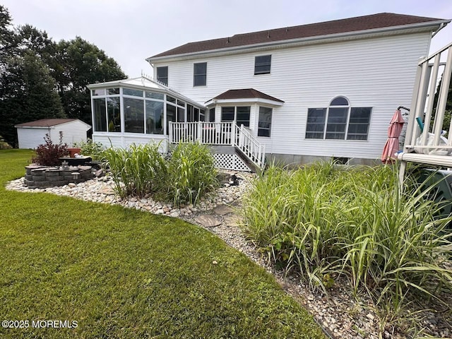 5 Samantha Dr, Monroe, NJ 08831 - rear view of house featuring a sunroom, a yard, and a deck