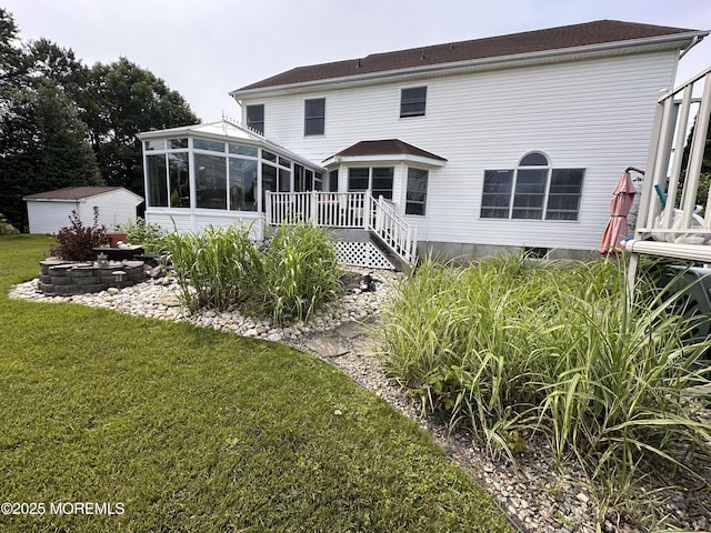 5 Samantha Dr, Monroe, NJ 08831 - back of property with a sunroom, a yard, and a wooden deck