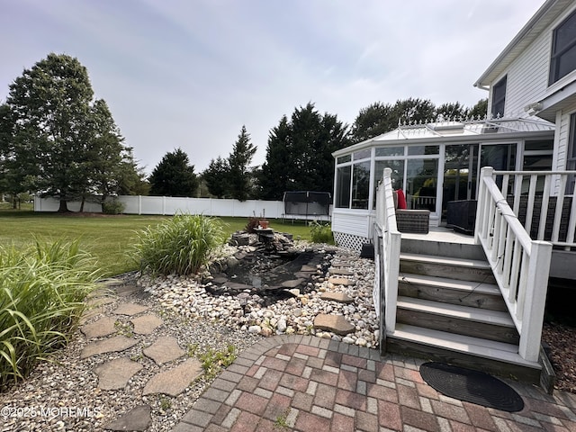 5 Samantha Dr, Monroe, NJ 08831 - view of patio with a sunroom, a trampoline, and stairway