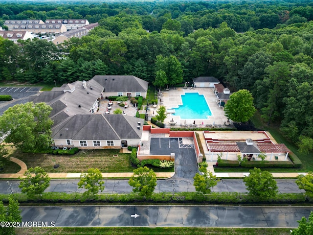 632 Sophee Ln, Lakewood, NJ 08701 - bird's eye view of a pool and a forest