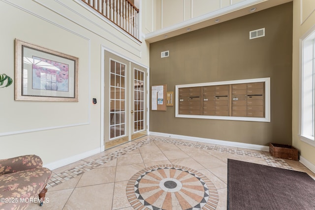 632 Sophee Ln, Lakewood, NJ 08701 - interior space with a high ceiling, mail area, and french doors