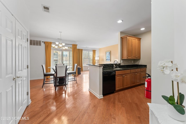 632 Sophee Ln, Lakewood, NJ 08701 - kitchen with dishwasher, a chandelier, light wood-style flooring, brown cabinetry, and recessed lighting